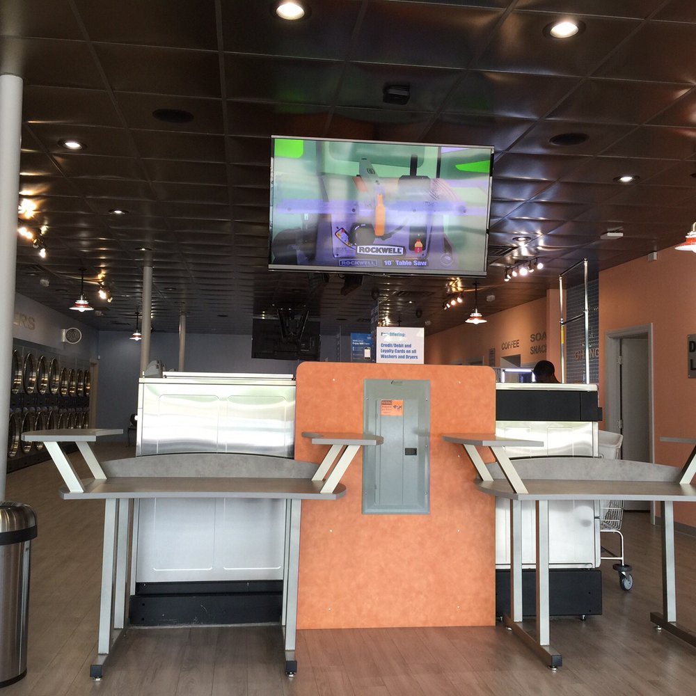 Your Laundry - Very clean atmosphere with large screen TV's scattered around the room! - Laundry Services Near Me - Milwaukee, Wisconsin Your Laundry - Very clean atmosphere with large screen TV's scattered around the room! - Laundry Services Near Me - Milwaukee, Wisconsin