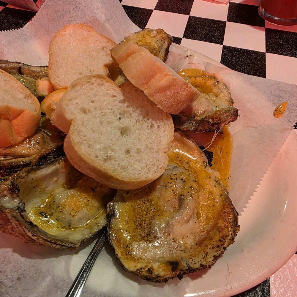 Acme Oyster House - 1/2 Dozen Chargrilled Oysters - Seafood Near Me - Metairie, Louisiana Acme Oyster House - 1/2 Dozen Chargrilled Oysters - Seafood Near Me - Metairie, Louisiana