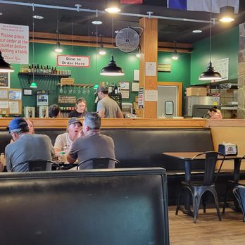 Brooklyn Pizza Parlor - people sitting at tables eating - Pizza Near Me - Charlotte, North Carolina Brooklyn Pizza Parlor - people sitting at tables eating - Pizza Near Me - Charlotte, North Carolina