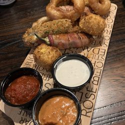 The Bonfire - Sampler. I love the bacon wrapped jalapeños!