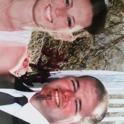Mike Nicholas Photography - You can see here how my husband looks like he is wearing eyeshadow & blush. My dress is pink and my lips are orange.