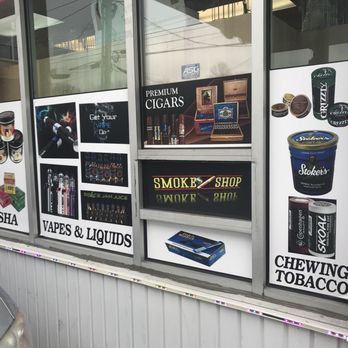 bp - a display of cigarettes and tobacco - Gas Stations Near Me - Newark, Delaware