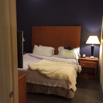 Homewood Suites by Hilton Ithaca - King bedroom with our personal blanket from home. My hubby is a Blanket hog - Hotels Near Me - Ithaca, New York Homewood Suites by Hilton Ithaca - King bedroom with our personal blanket from home. My hubby is a Blanket hog - Hotels Near Me - Ithaca, New York