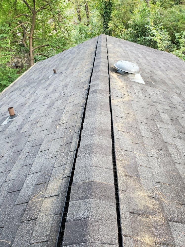 Slide of Rashids Roofing