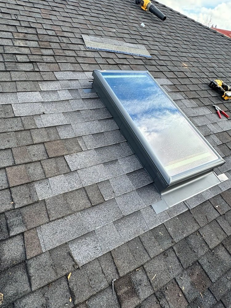 Slide of Maginis Roofing