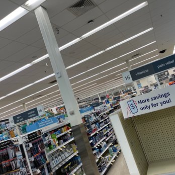 Walgreens - a sign in the aisle of a store - Drugstores Near Me - Amherst, New York