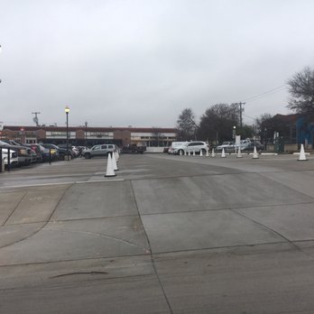 Bishop Arts District - At least 50 spots are open and blocked off as people try to find a parking place - Shopping Centers Near Me - Dallas, Texas