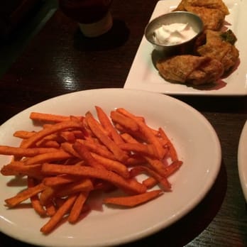 Houlihan's - Sweet potato fries with cinnamon sugar and spicy chicken avocado egg rolls - Bars Near Me - Paramus, New Jersey Houlihan's - Sweet potato fries with cinnamon sugar and spicy chicken avocado egg rolls - Bars Near Me - Paramus, New Jersey