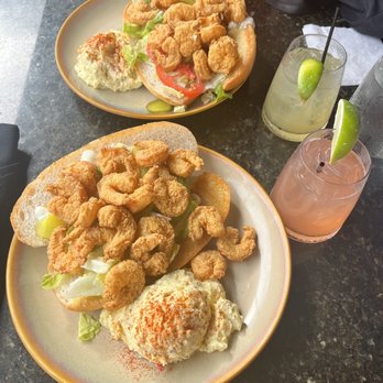 Curio Bistro - Fried Shrimp Po-Boy, creole potato salad - Cajun/Creole Near Me - New Orleans, Louisiana