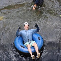 Kaua'i Backcountry Adventures - Tubing through sugar cane irrigation tunnels