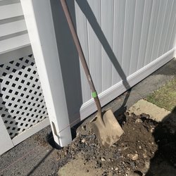 Greloch Fence - Dug right into my driveway because neighbor said it was okay... make it make sense!?