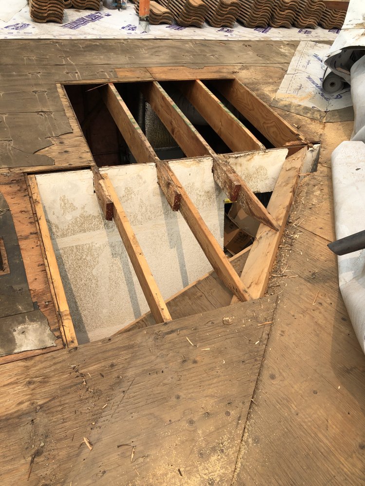 Slide of Tello's Roofing