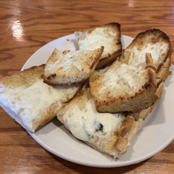 Ziti's Italian Trattoria - Sub roll garlic bread with cheese .. no garlic taste 8 bucks? Was 1.00 extra for cheese? - Italian Near Me - Natick, Massachusetts