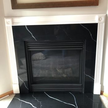 Distinctive Stone Interiors - My fireplace surround. - Countertop Installation Near Me - Vadnais Heights, Minnesota Distinctive Stone Interiors - My fireplace surround. - Countertop Installation Near Me - Vadnais Heights, Minnesota