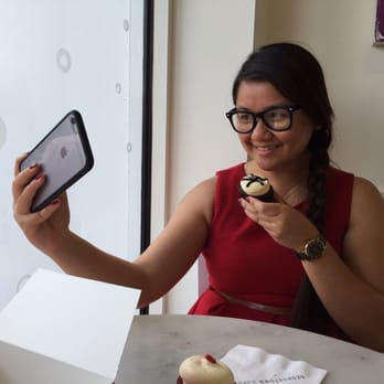 Georgetown Cupcake - My friend took a photo of me as I take a selfie with ny cupcake :D - Cupcakes Near Me - Washington, DC, District of Columbia