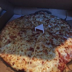 Domino's Pizza - Medium deep dish cheese with extra sauce.