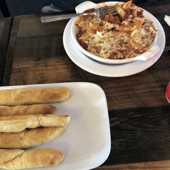 Fazoli's - a plate of breadsticks and a pizza - Italian Near Me - Danville, Kentucky