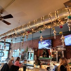 Ellicottville Tap+Bottle Taqueria - Winter decorations over the bar, January, 2025.
