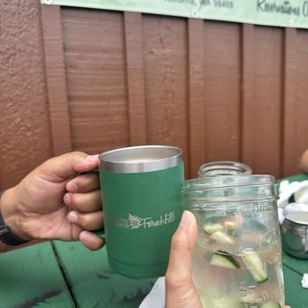 Tibbitts @ Fern Hill - Cucumber and lemon infused water for the table. Coffee in yeti-like cups. - New American Near Me - Tacoma, Washington
