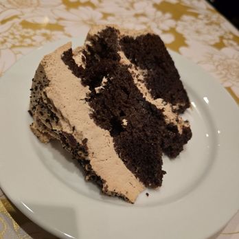 Last Resort Grill - Espresso martini cake slice. At $10.30 w/ 3.5% table service charge I wouldn't recommend. Note large missing piece. - Southern Near Me - Athens, Georgia