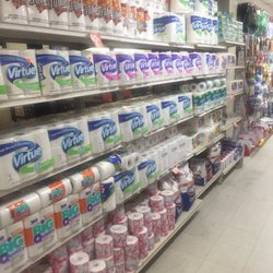 Dollar Mart - .99€ paper towels , .99€ toilet paper .99€ napkin