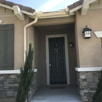 Rancho Rain Gutters - Rain gutter installed over the front entry landing. Rain poured down like a waterfall. Problem solved! - Roofing Near Me - Upland, California
