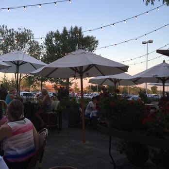 BLVD Kitchen & Bar - Outdoor eating and bar. Food is spectacular, wait staff is great and we are eating tenderloin sliders and tuna sashimi. - American Near Me - Minnetonka, Minnesota