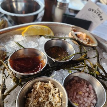 King's Fish House - Tempe - Some of the sauces. Cocktail, shredded horseradish, onions sauce that has a flashy name to it and something else - Seafood Near Me - Tempe, Arizona