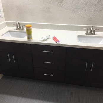 Kitchen and Bath Wizards - After just need to paint a little and hang the mirror! - Countertop Installation Near Me