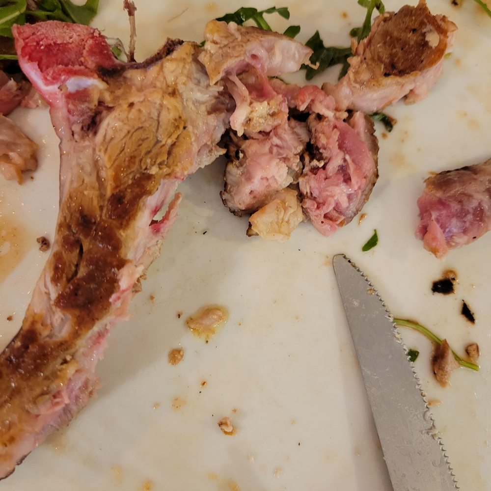 Il Piastrato - Pictures of raw pork chop - Pubs Near Me - Naples, NA