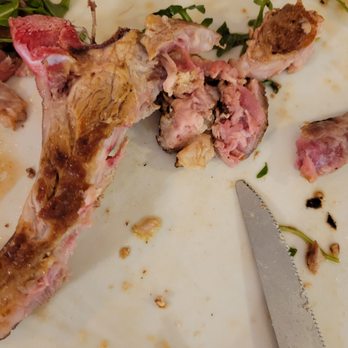 Il Piastrato - Pictures of raw pork chop - Pubs Near Me - Naples, NA