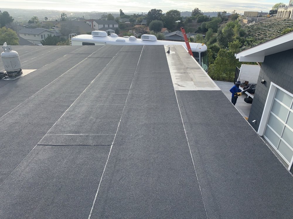 Slide of M G Roofing