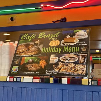 Cafe Brazil - a menu and a neon sign - Coffee & Tea Near Me - Carrollton, Texas Cafe Brazil - a menu and a neon sign - Coffee & Tea Near Me - Carrollton, Texas