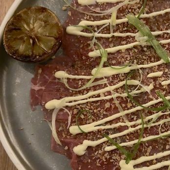 Equal Parts - Beef Carpaccio: Garlic oil, breadcrumb, housemade kewpie mayo, scallion, charred lime ($20) - New American Near Me - San Francisco, California Equal Parts - Beef Carpaccio: Garlic oil, breadcrumb, housemade kewpie mayo, scallion, charred lime ($20) - New American Near Me - San Francisco, California