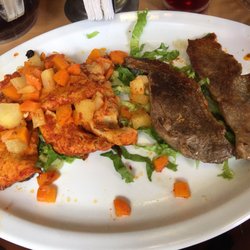 El Tic Tic - House specialty enchiladas but with steak instead of chicken side