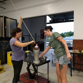 Ghost Pepper Glass - Katie and Lauren are adding a stem to end of a garden float - Glass Blowing Near Me - Austin, Texas Ghost Pepper Glass - Katie and Lauren are adding a stem to end of a garden float - Glass Blowing Near Me - Austin, Texas