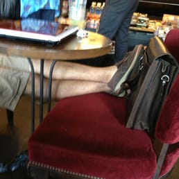 This is arrogance, right? Feet on chair which others sit on... This is arrogance, right? Feet on chair which others sit on...