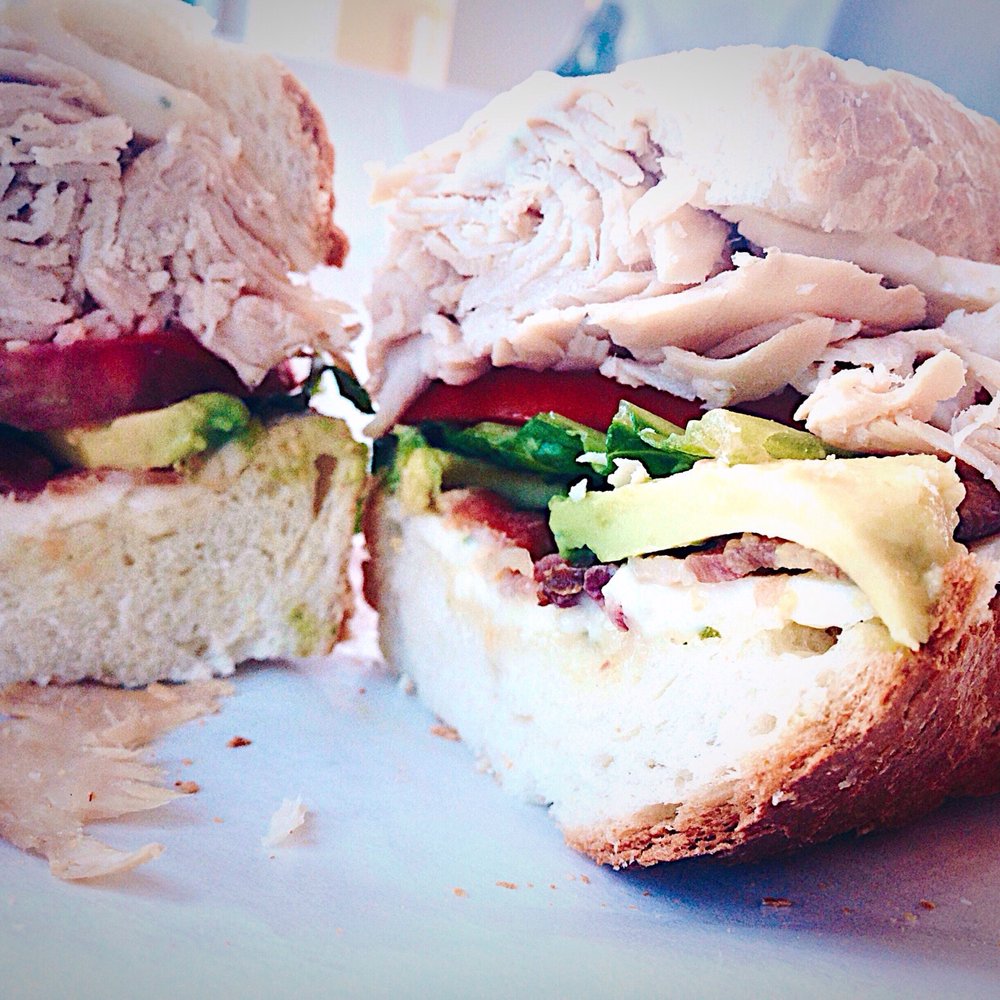 Taste - Northender--honey smoked turkey, hardwood smoked bacon, havarti, avocado, romaine, tomato, basil mayo on french bread ($8.99) - Specialty Food Near Me - Suffolk, Virginia