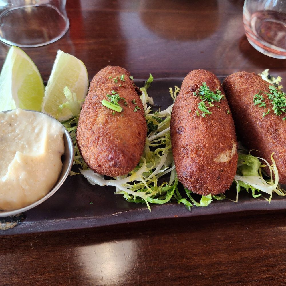 Guajiros Miami Eatery - BUÑUELOS de BACALAO - Coffee & Tea Near Me - Charlottesville, Virginia Guajiros Miami Eatery - BUÑUELOS de BACALAO - Coffee & Tea Near Me - Charlottesville, Virginia