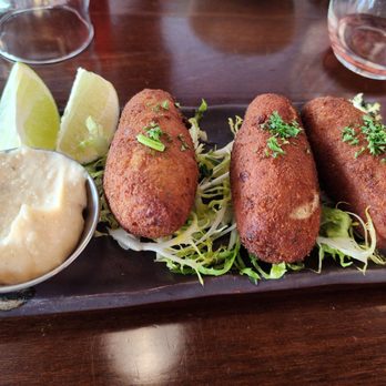 Guajiros Miami Eatery - BUÑUELOS de BACALAO - Coffee & Tea Near Me - Charlottesville, Virginia Guajiros Miami Eatery - BUÑUELOS de BACALAO - Coffee & Tea Near Me - Charlottesville, Virginia