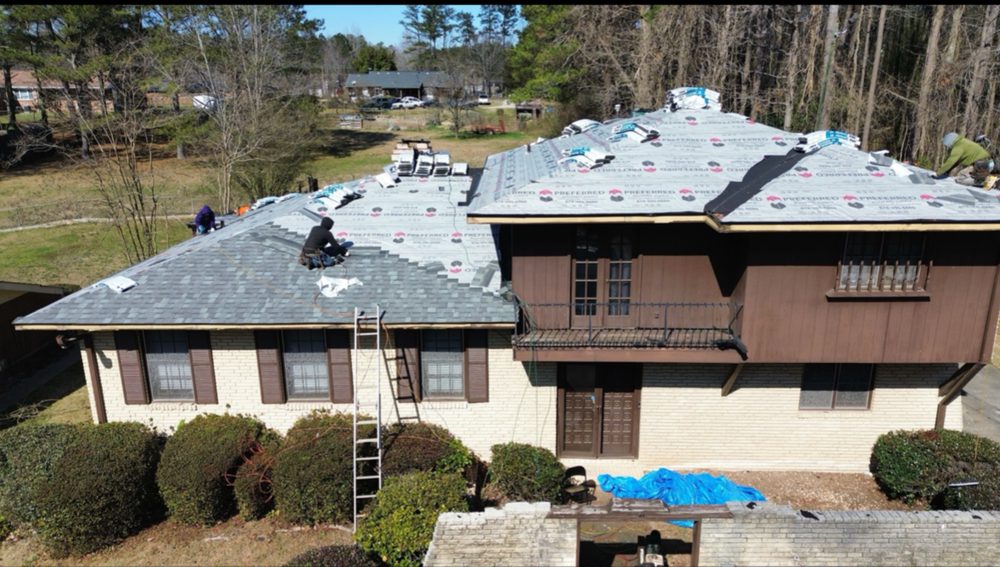 Slide of R Performance Roofing