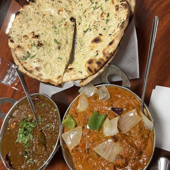 Indian Tadka - shrimp curry (left) | chicken tikka masala (right) + garlic naan - Indian Near Me - Sunnyvale, California Indian Tadka - shrimp curry (left) | chicken tikka masala (right) + garlic naan - Indian Near Me - Sunnyvale, California