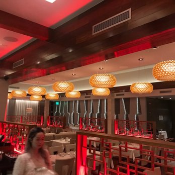 Moonstone - the interior of a restaurant with red lighting - Chinese Near Me - Great Neck, New York