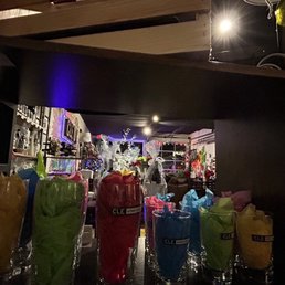 a bar filled with bottles of wine a bar filled with bottles of wine