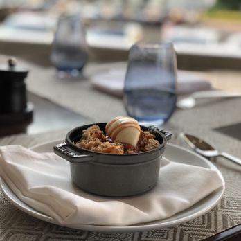 Society 1854 - a bowl of food on a table - New American Near Me - Omaha, Nebraska