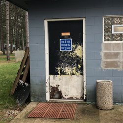 Men's restroom door.  Anyone else find the sign funny??