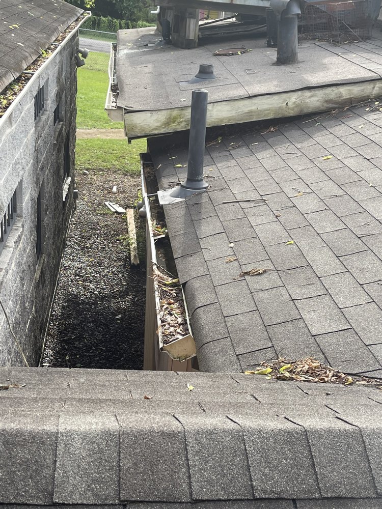 Slide of Marcus Gutters Cleaning