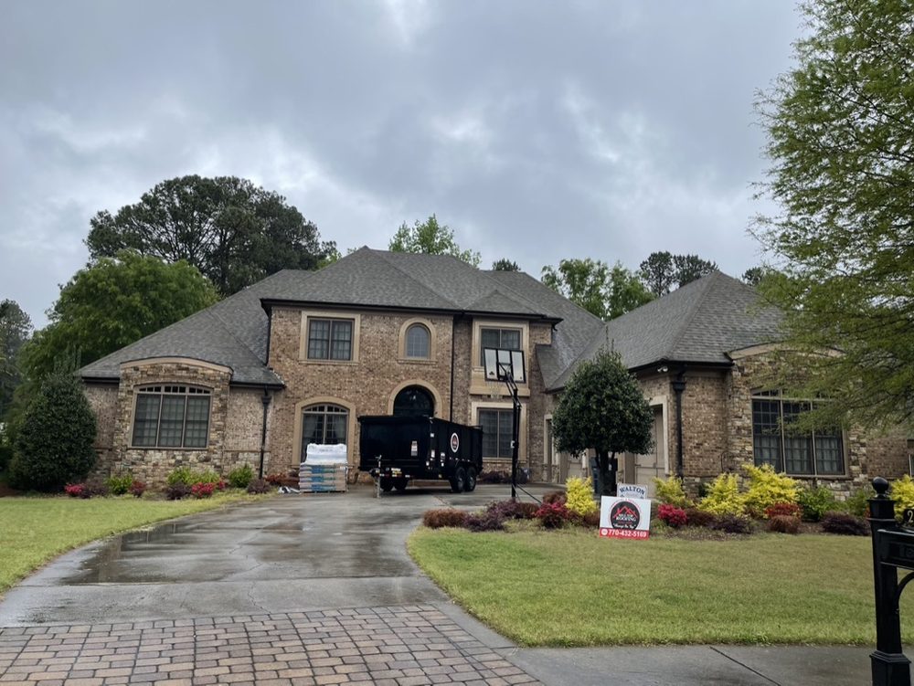 Slide of Hill Top Roofing