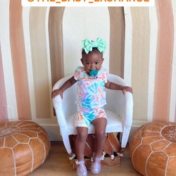 The Baby Exchange - My baby girl in the play area taking a photo for $2.50 off