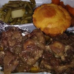 Juicy's Soul Food Cafe - Oxtails, green beans, candied yams and a cornbread muffin